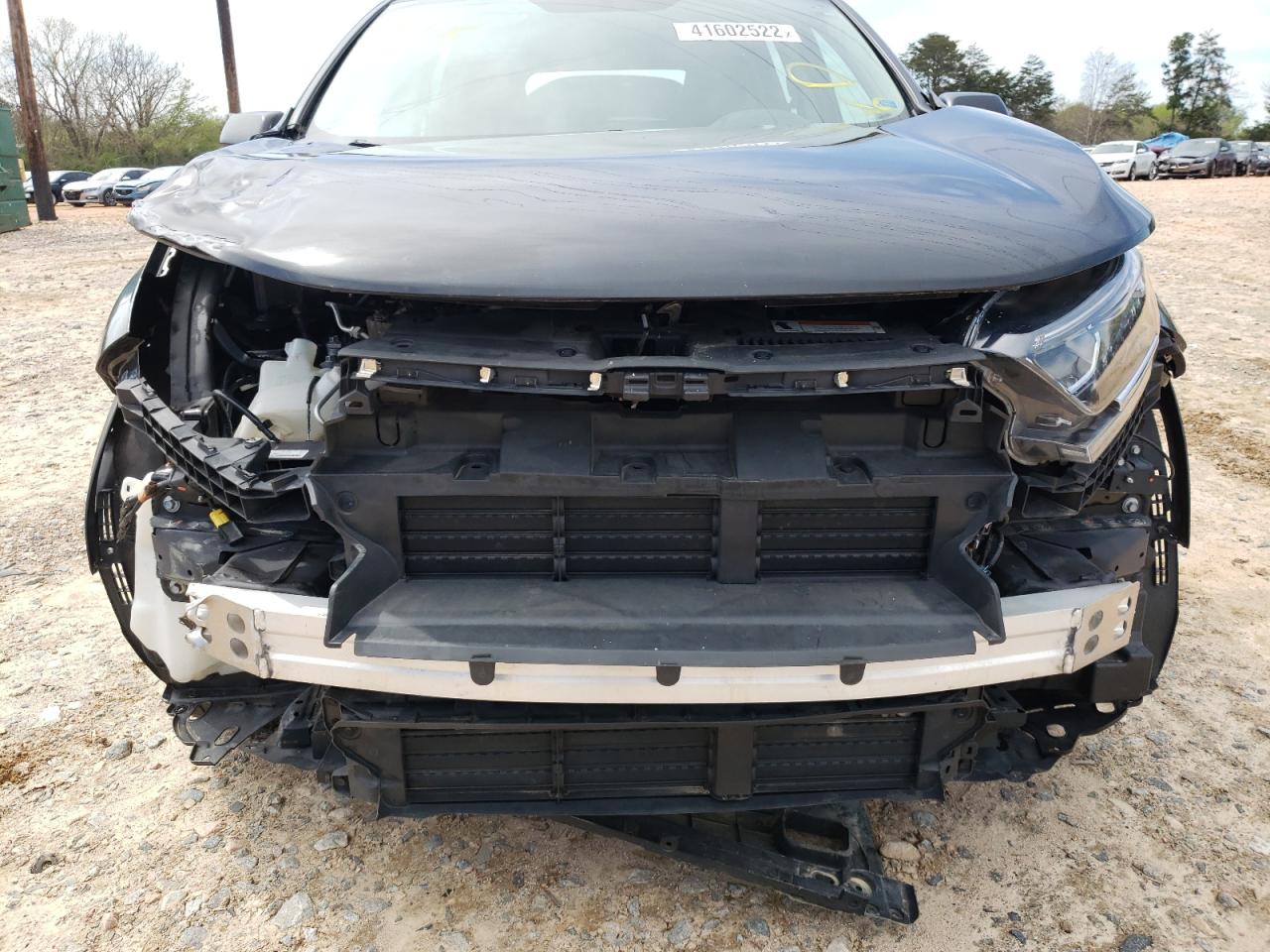 Photo 9 from auction – 2017 HONDA CR-V LX with VIN 7FARW5H38HE012805