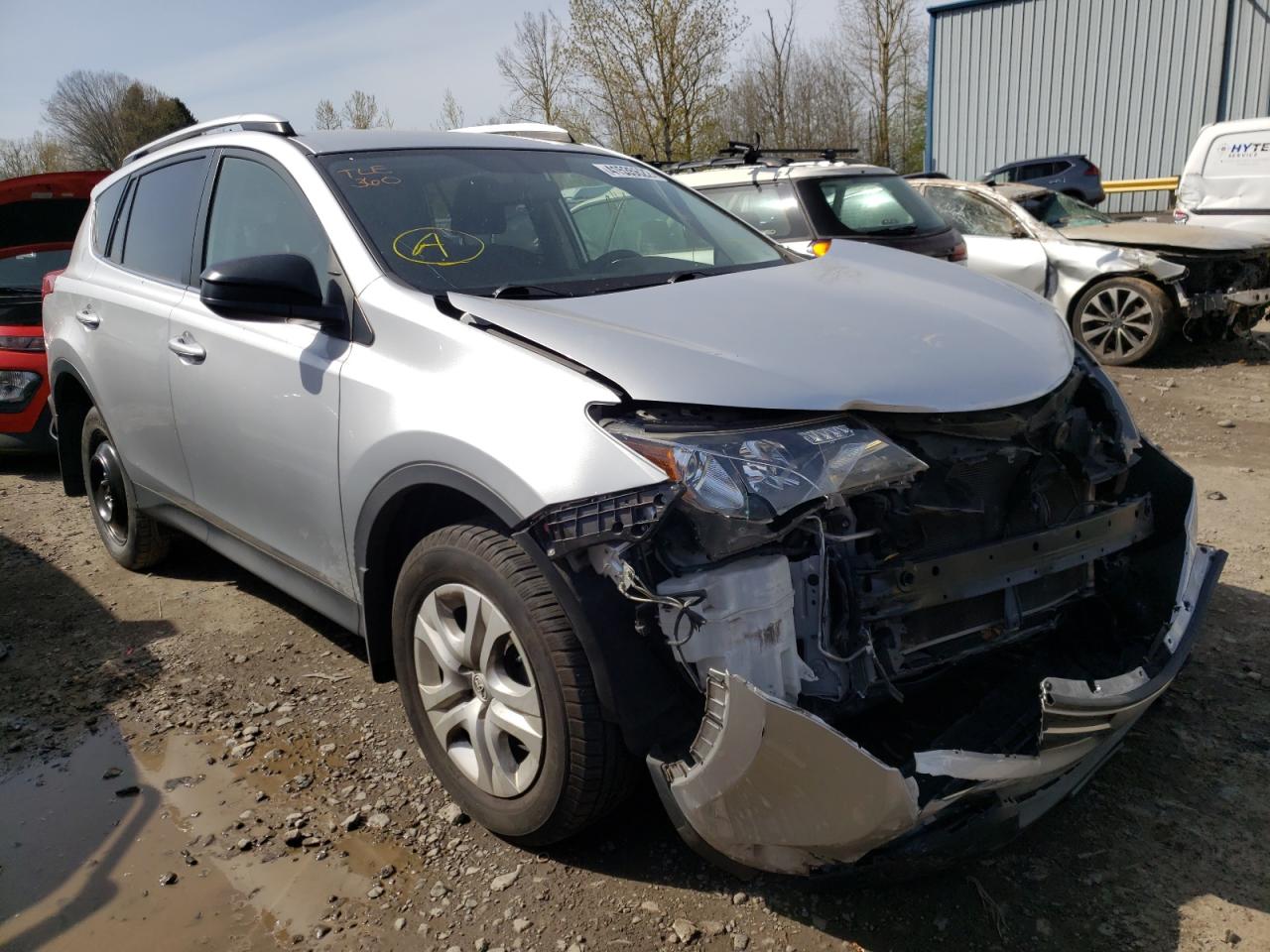 TOYOTA RAV4 LE 2014 with VIN JTMBFREV3ED062900 - Photo from auction