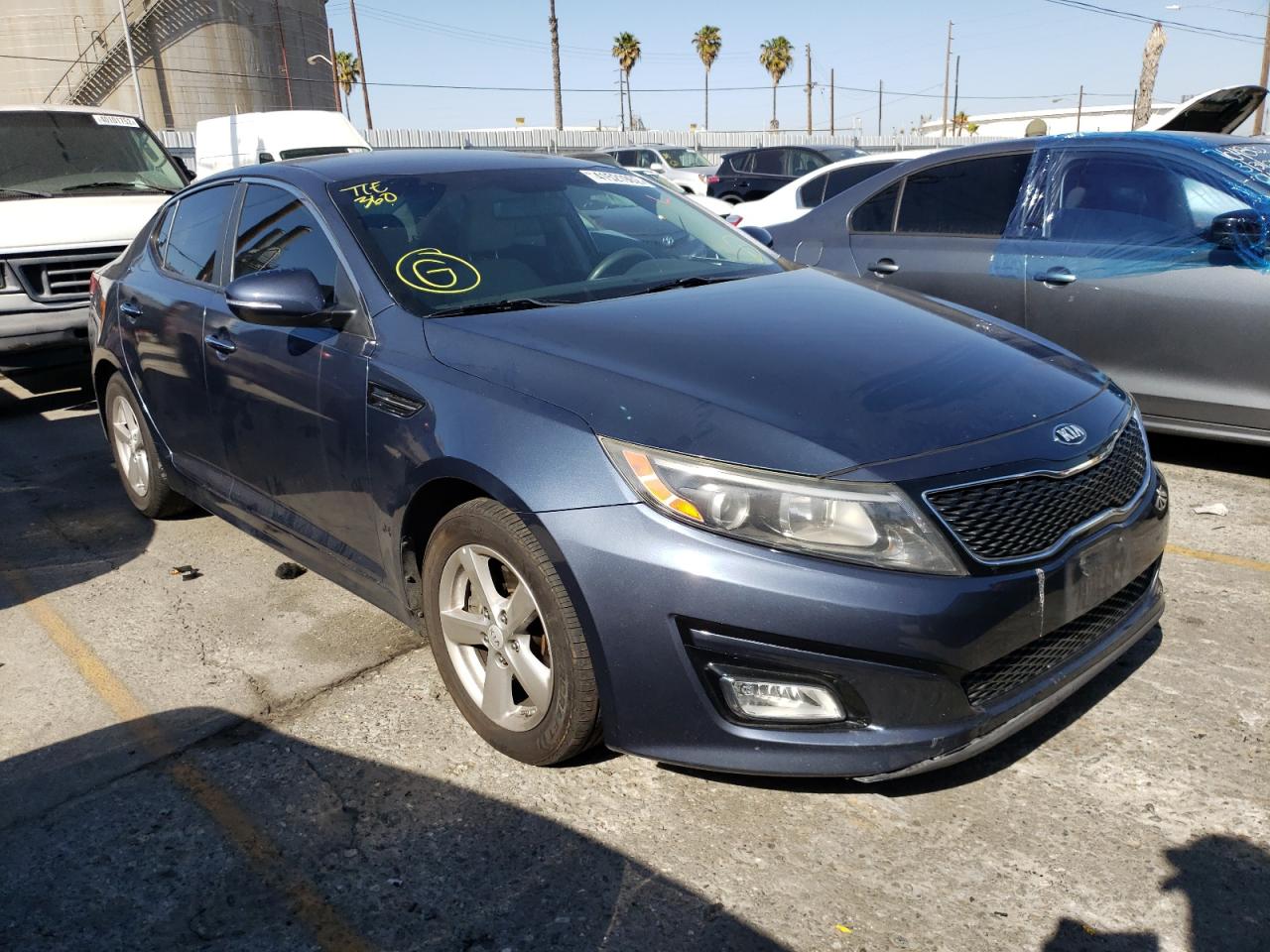 KIA OPTIMA LX 2015 with VIN 5XXGM4A74FG477513 - Photo from auction