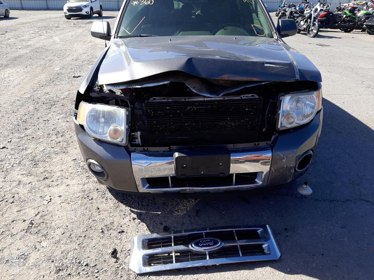 Photo 9 from auction – 2011 FORD ESCAPE LIM with VIN 1FMCU0EG7BKB26818