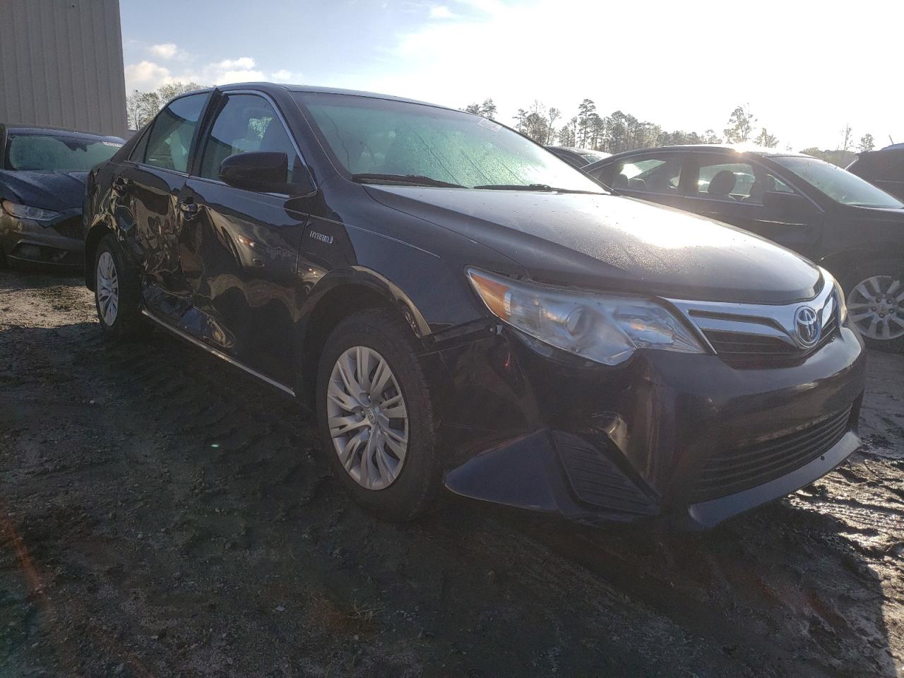 TOYOTA CAMRY HYBR 2012 with VIN 4T1BD1FK0CU021032 - Photo from auction