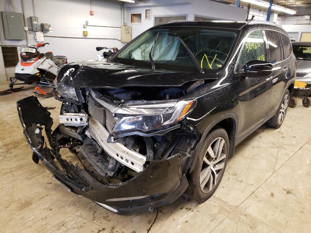 Photo 2 from auction – 2017 HONDA PILOT ELIT with VIN 5FNYF6H08HB100272