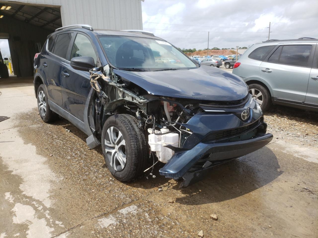 Photo 1 from auction – 2018 TOYOTA RAV4 LE with VIN JTMZFREV0JJ731537
