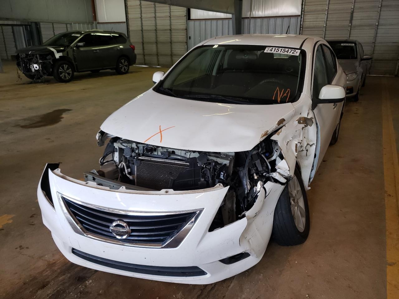 Photo 9 from auction – 2014 NISSAN VERSA S with VIN 3N1CN7AP2EL830432