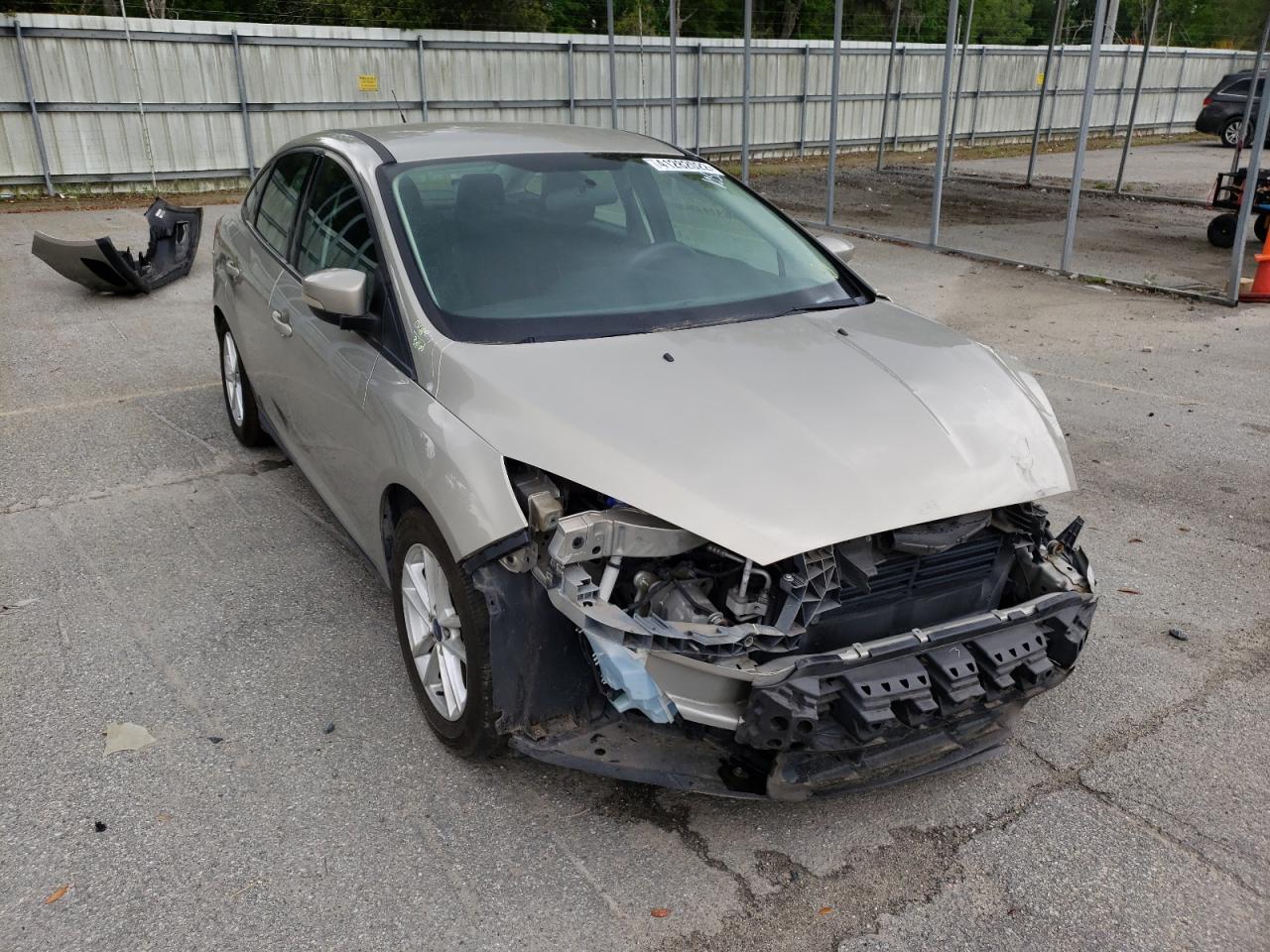 FORD FOCUS SE 2016 with VIN 1FADP3F28GL371056 - Photo from auction