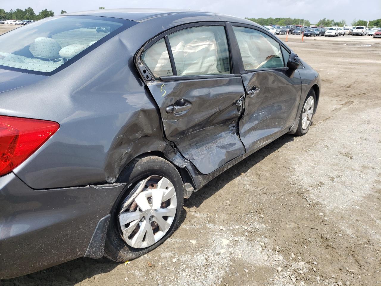 Photo 9 from auction – 2012 HONDA CIVIC LX with VIN 19XFB2F59CE016132