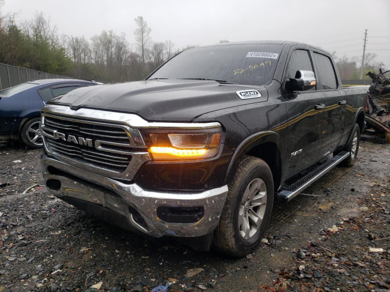 Photo 2 from auction – 2021 RAM 1500 LARAM with VIN 1C6SRFRT2MN779089