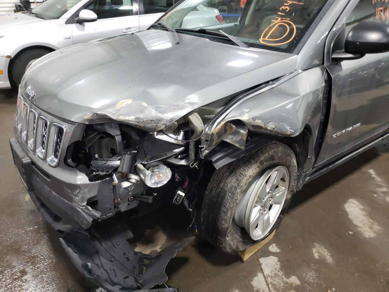Photo 9 from auction – 2014 JEEP COMPASS SP with VIN 1C4NJCBA6ED573463