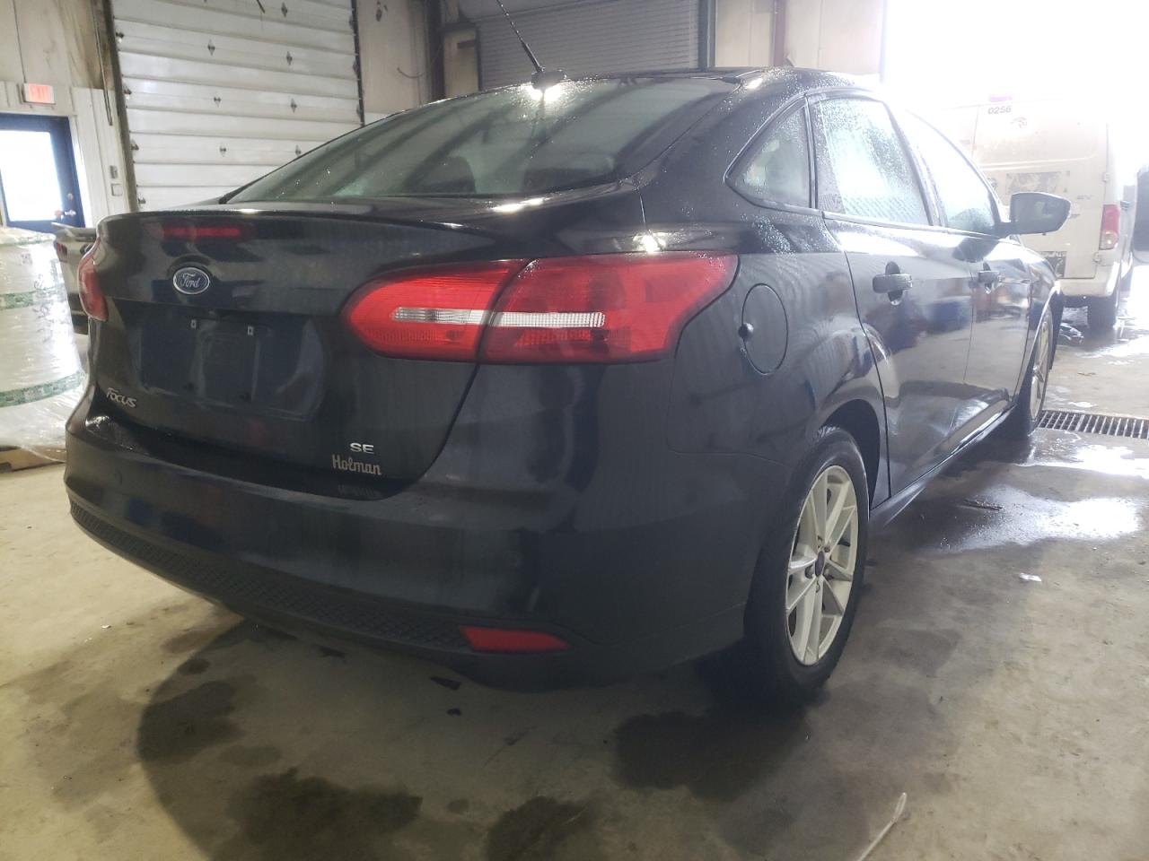 Photo 4 from auction – 2015 FORD FOCUS SE with VIN 1FADP3F24FL378083