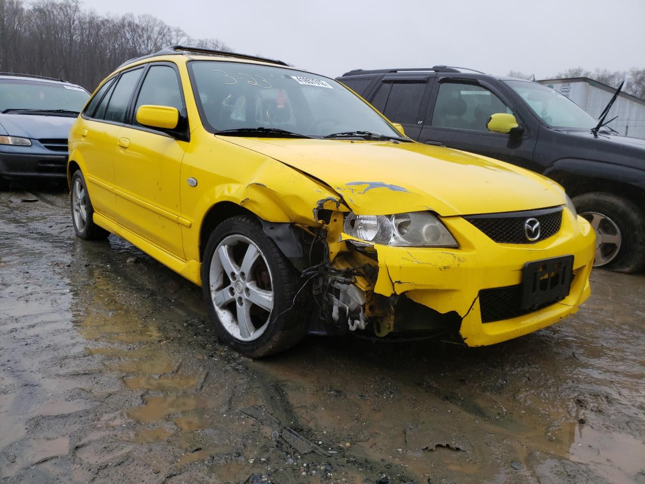 MAZDA PROTEGE PR 2002 with VIN JM1BJ245021623204 - Photo from auction