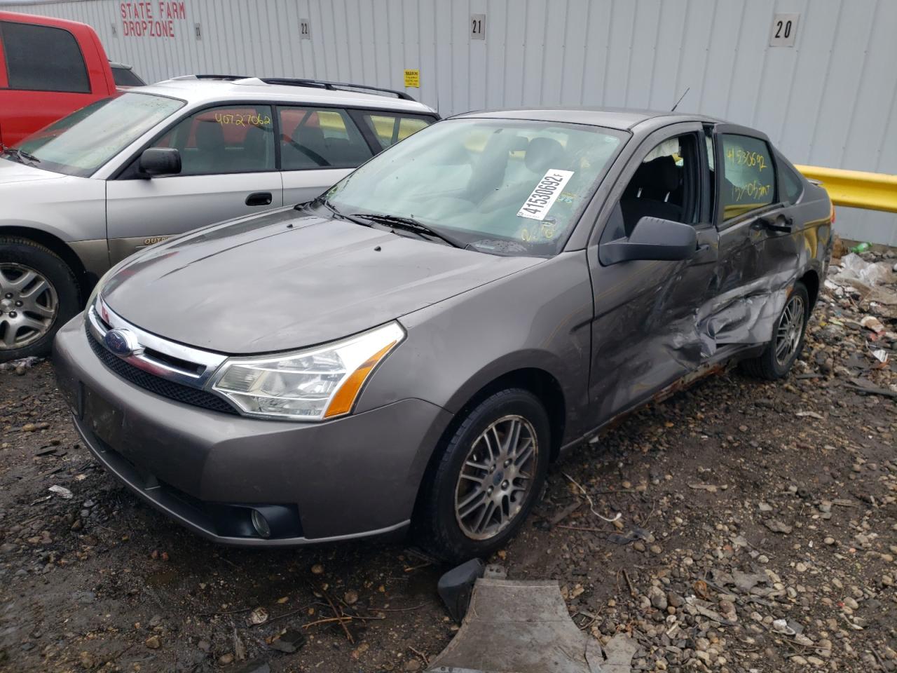 Photo 2 from auction – 2010 FORD FOCUS SE with VIN 1FAHP3FN2AW122995