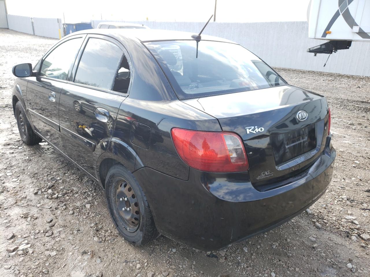 Photo 3 from auction – 2011 KIA RIO BASE with VIN KNADH4A3XB6857160