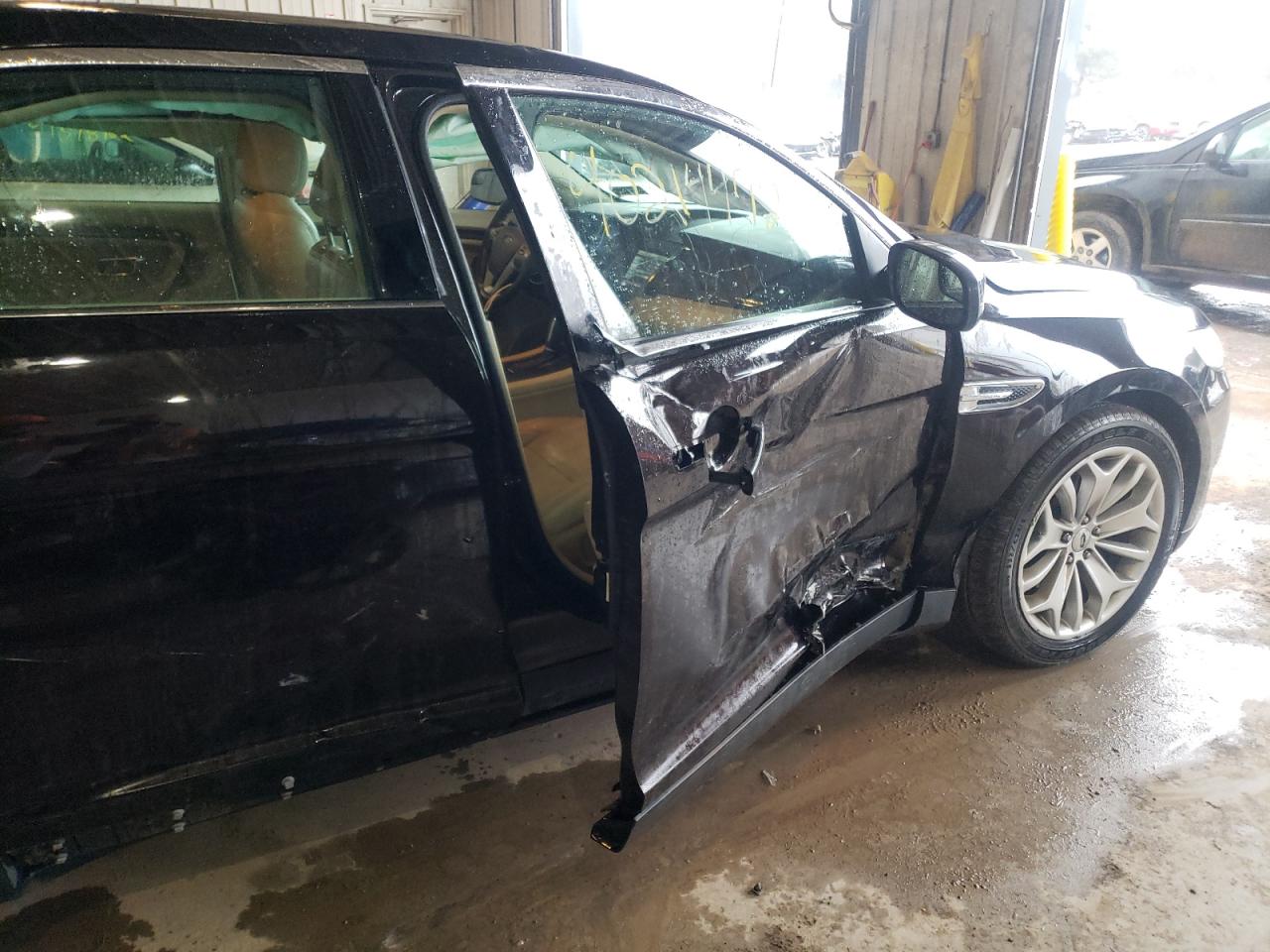 Photo 9 from auction – 2014 FORD TAURUS LIM with VIN 1FAHP2F87EG139263