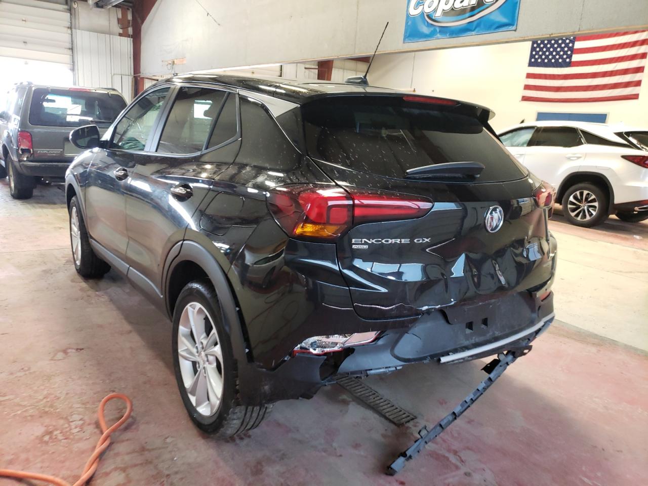 Photo 3 from auction – 2021 BUICK ENCORE GX with VIN KL4MMCSL0MB075302