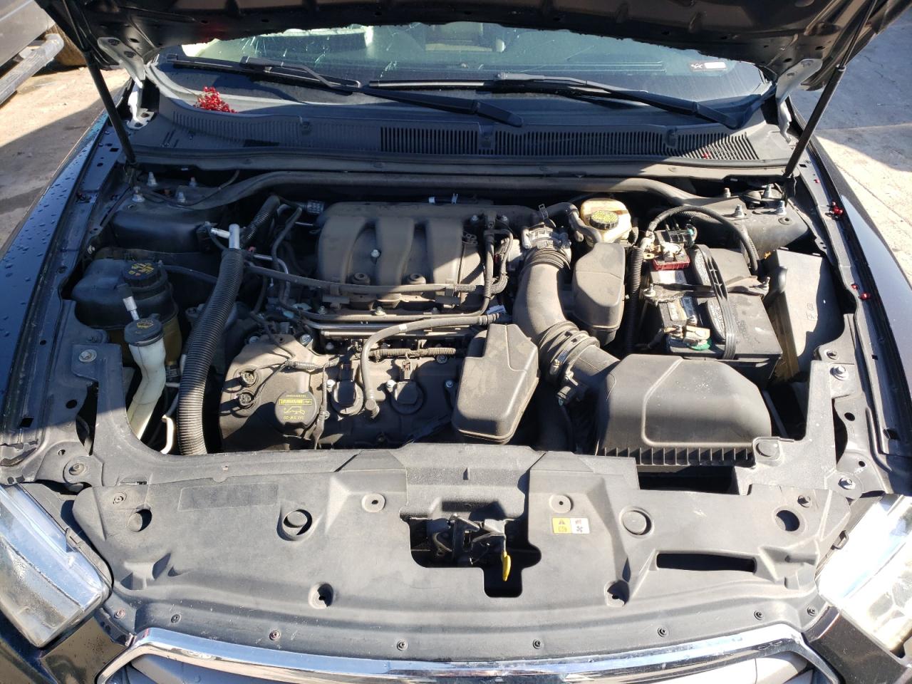 Photo 7 from auction – 2013 FORD TAURUS SEL with VIN 1FAHP2E8XDG142139