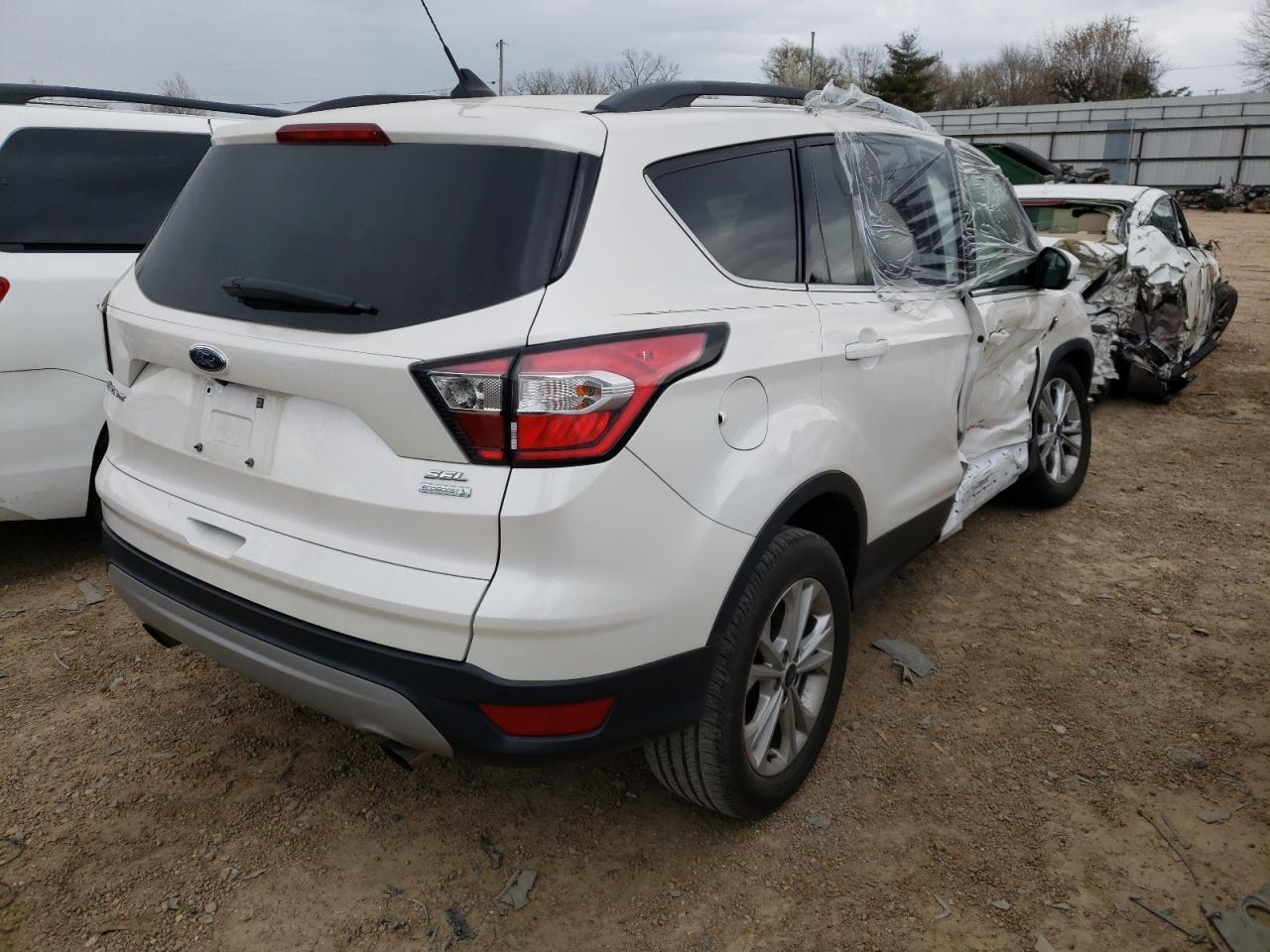 Photo 4 from auction – 2018 FORD ESCAPE SEL with VIN 1FMCU0HD6JUC34660