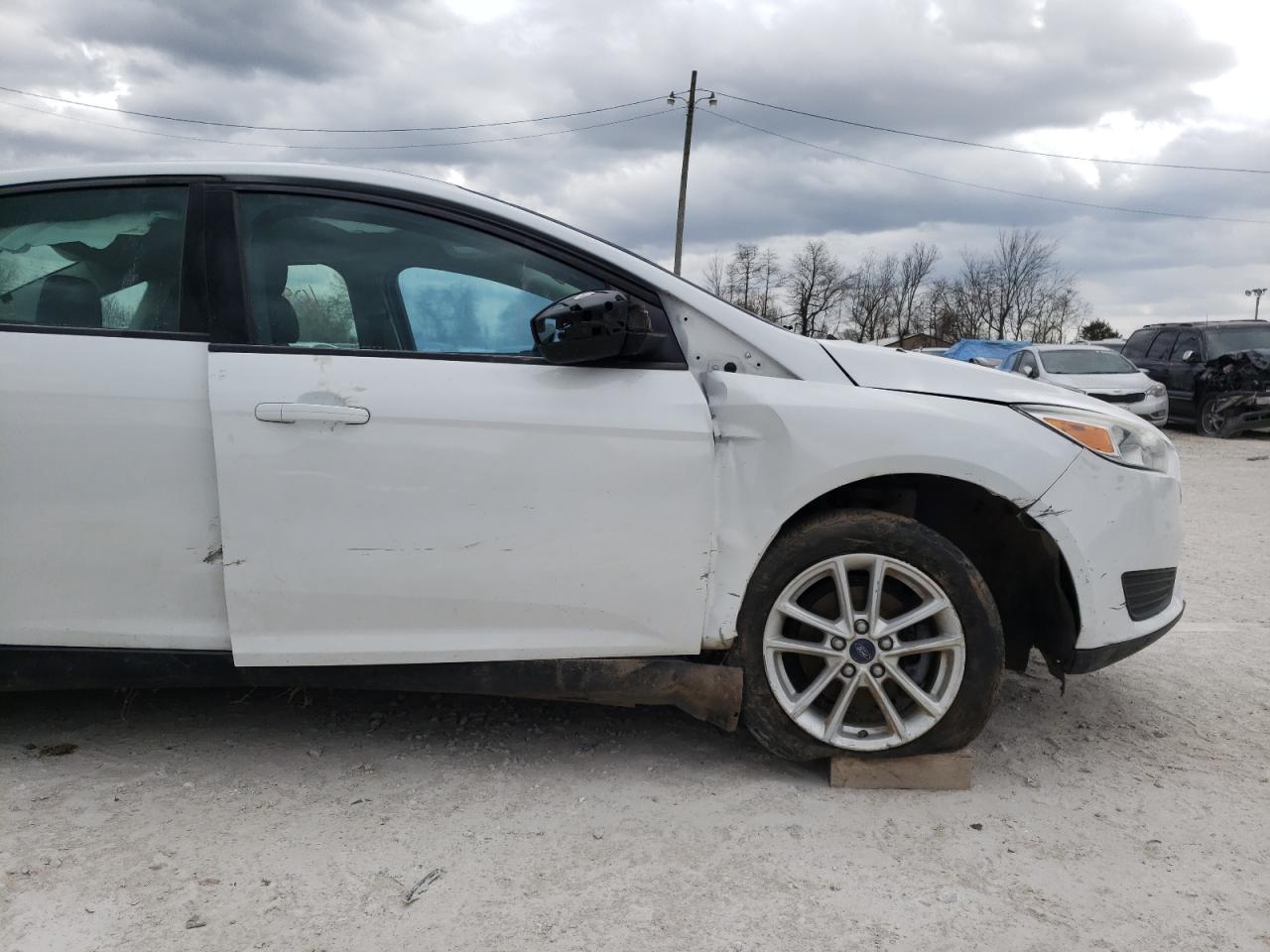 Photo 9 from auction – 2015 FORD FOCUS SE with VIN 1FADP3F27FL376022