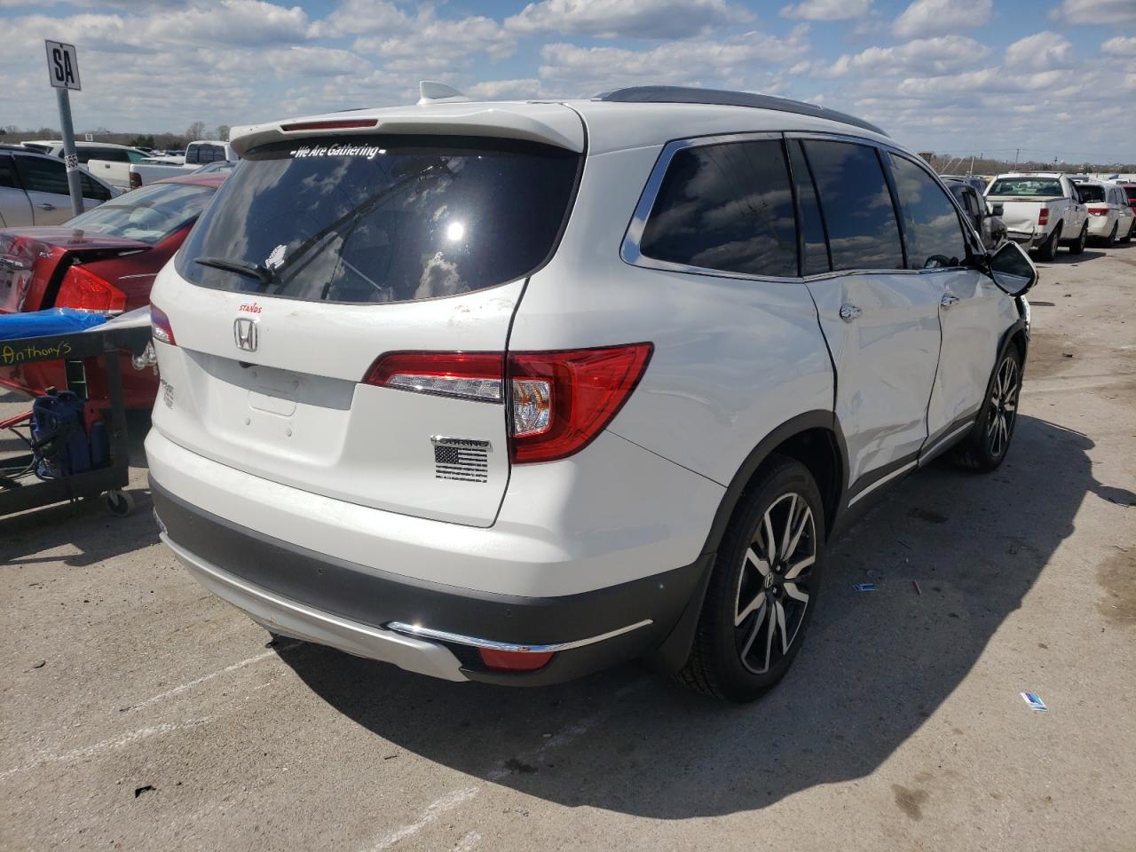 Photo 4 from auction – 2022 HONDA PILOT TOUR with VIN 5FNYF5H98NB004680