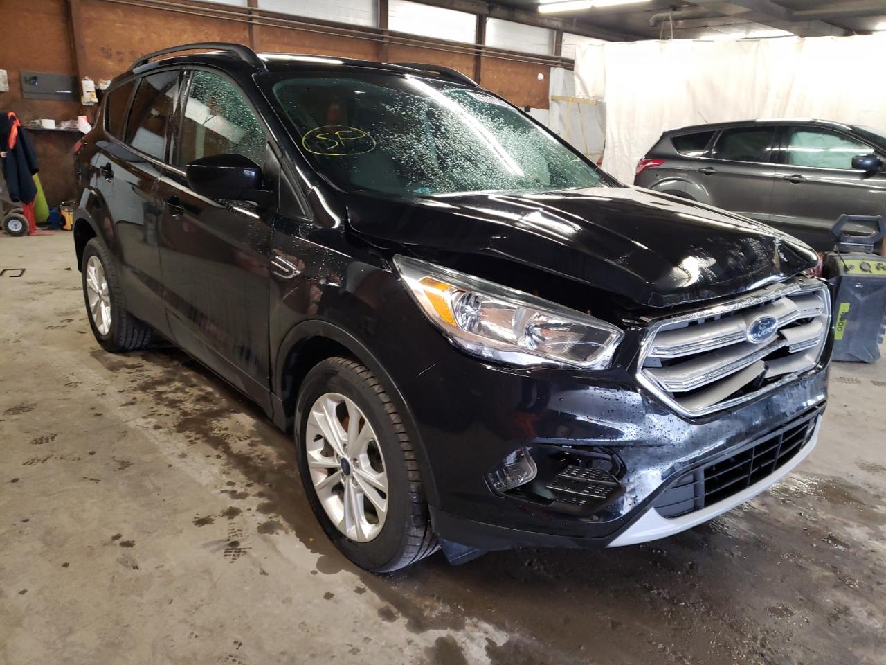 FORD ESCAPE SE 2018 with VIN 1FMCU9GD3JUA29206 - Photo from auction