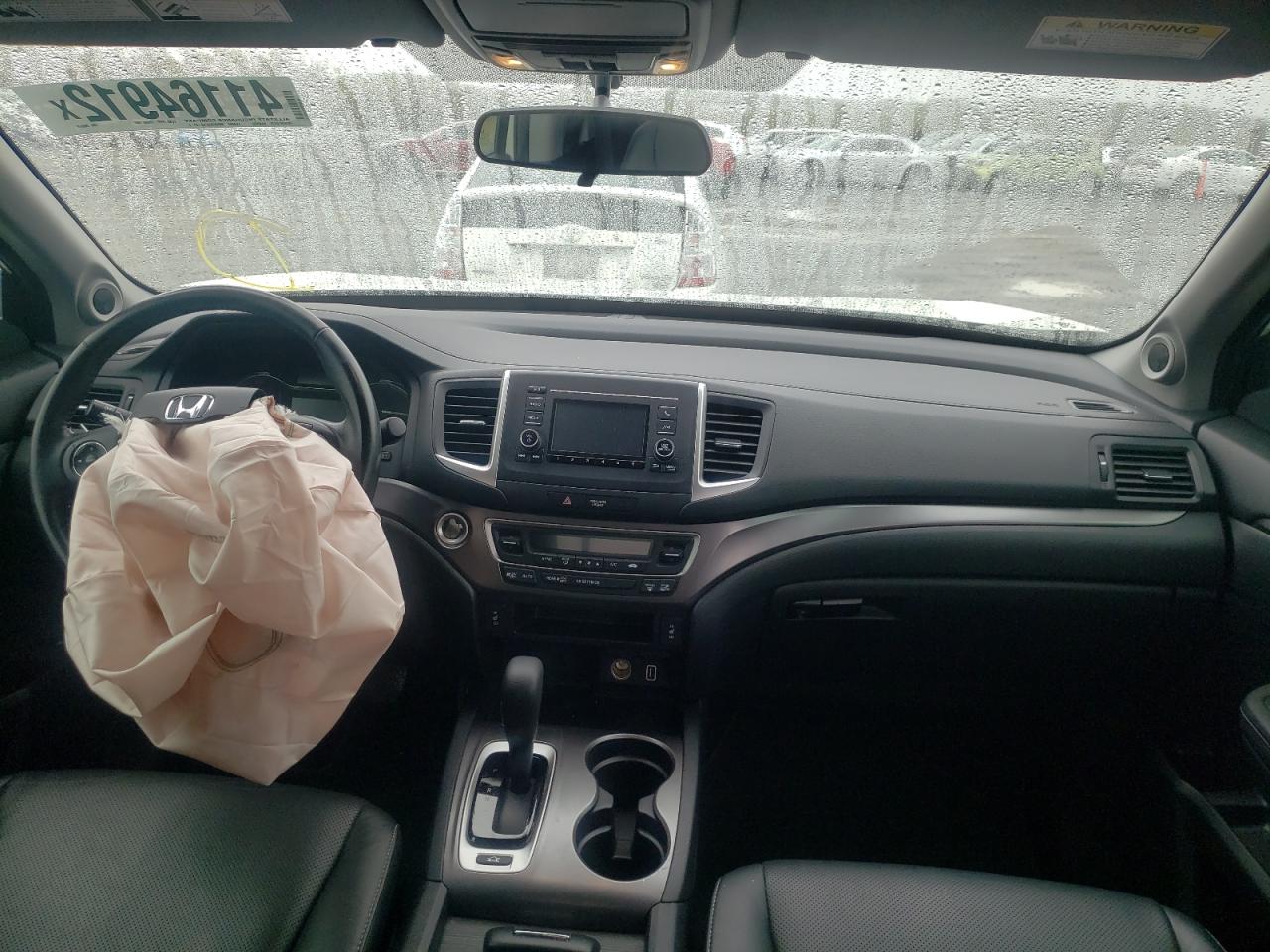 Photo 9 from auction – 2019 HONDA RIDGELINE with VIN 5FPYK3F55KB008978