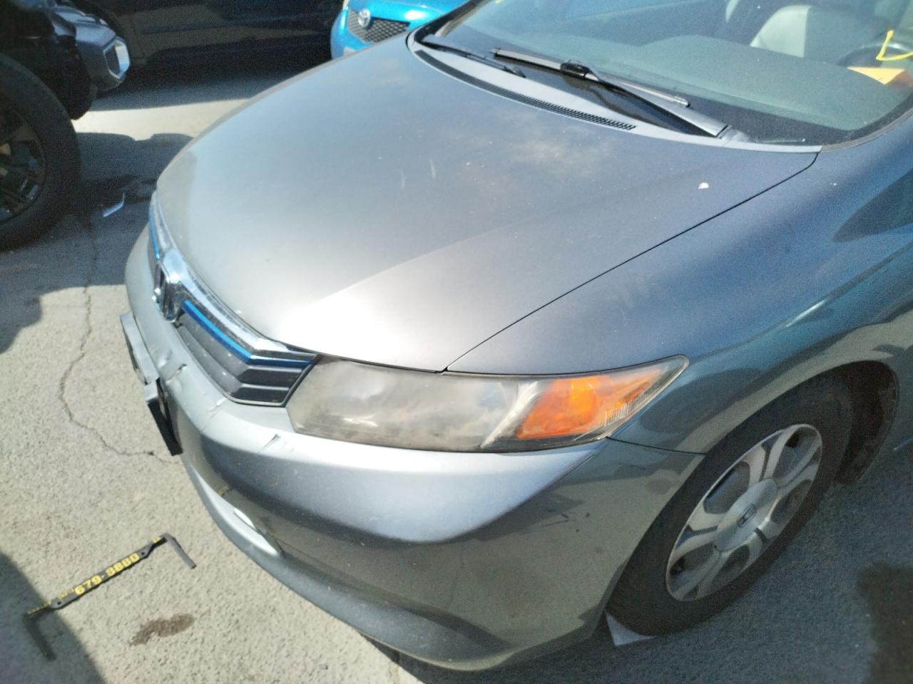 Photo 9 from auction – 2012 HONDA CIVIC HYBR with VIN JHMFB4F31CS001629