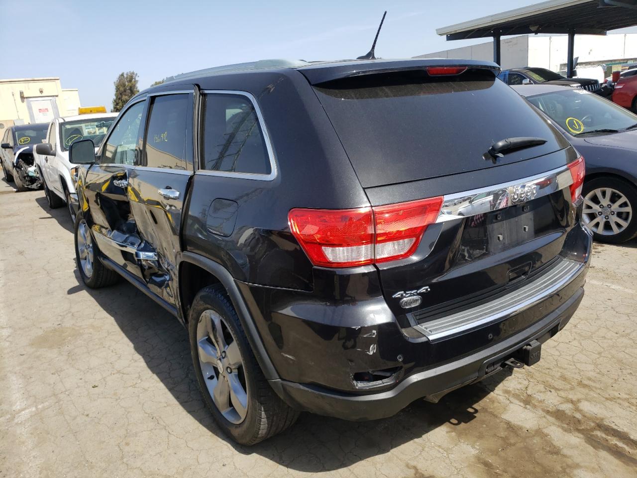 Photo 3 from auction – 2011 JEEP GRAND CHER with VIN 1J4RR6GT5BC620113
