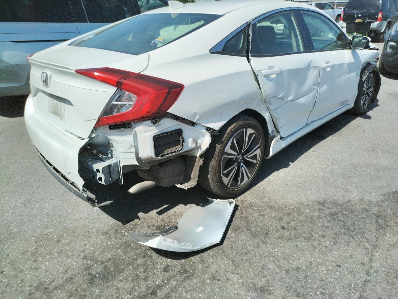 Photo 4 from auction – 2018 HONDA CIVIC EX with VIN JHMFC1F31JX020189