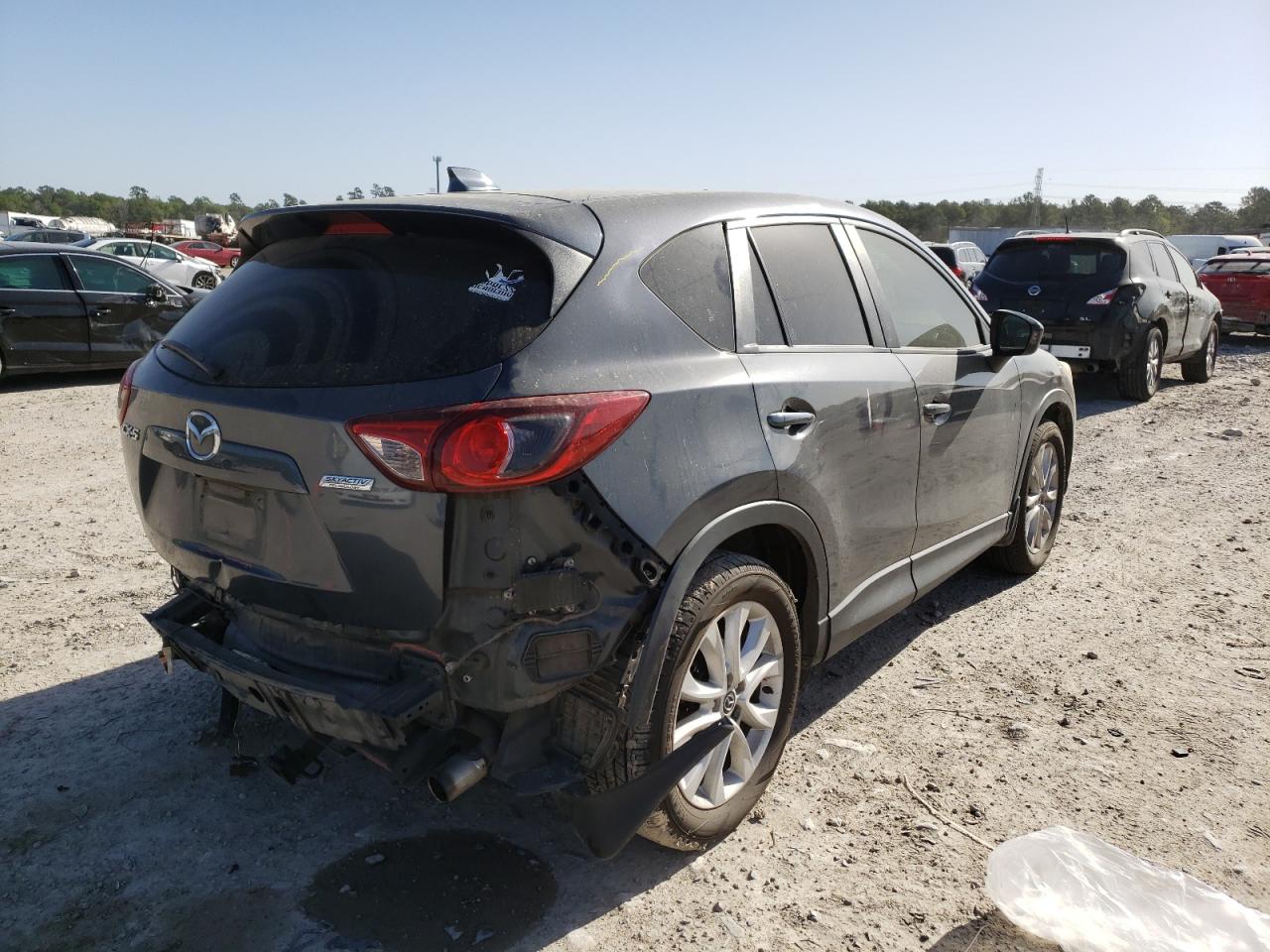 Photo 4 from auction – 2013 MAZDA CX-5 GT with VIN JM3KE2DEXD0125256