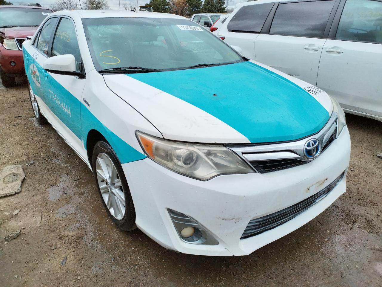 TOYOTA CAMRY HYBR 2013 with VIN 4T1BD1FK7DU072299 - Photo from auction
