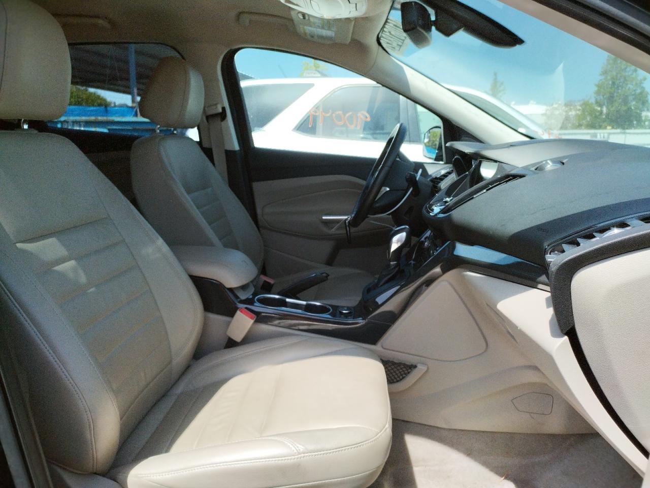 Photo 5 from auction – 2016 FORD ESCAPE TIT with VIN 1FMCU9J93GUA77639