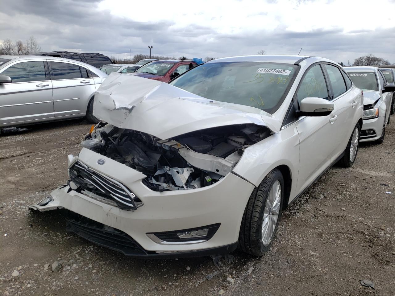 Photo 2 from auction – 2016 FORD FOCUS TITA with VIN 1FADP3J23GL358917