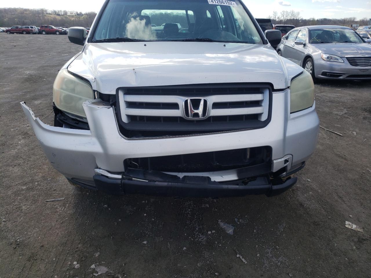Photo 9 from auction – 2006 HONDA PILOT LX with VIN 5FNYF18156B016368