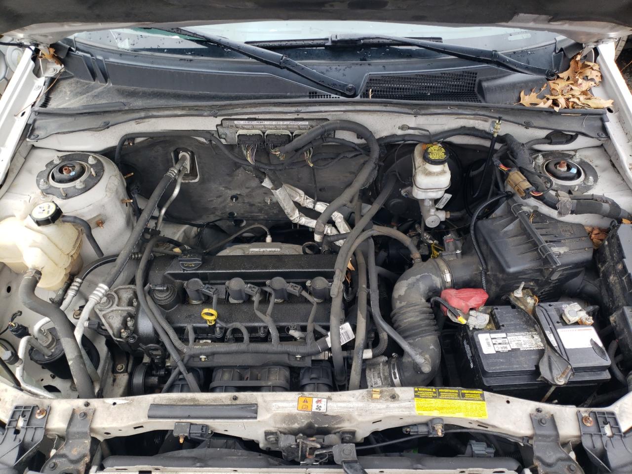 Photo 7 from auction – 2011 FORD ESCAPE LIM with VIN 1FMCU0E77BKB27581