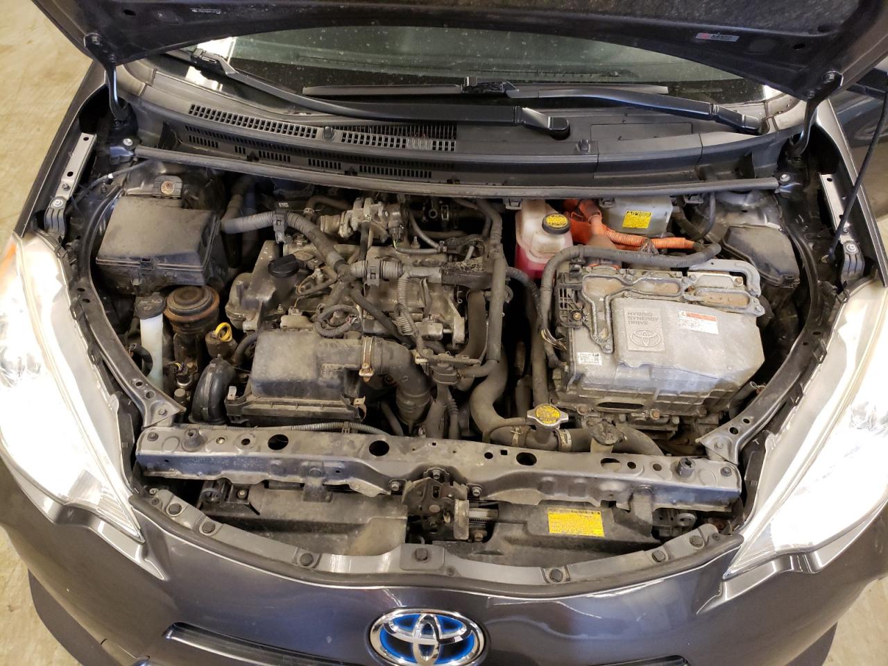 Photo 7 from auction – 2012 TOYOTA PRIUS C with VIN JTDKDTB34C1511540
