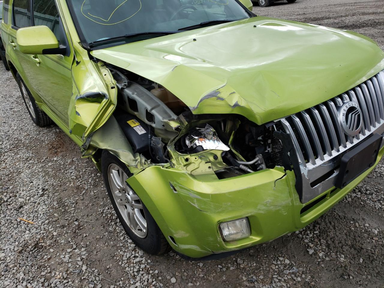 Photo 9 from auction – 2011 MERCURY MARINER PR with VIN 4M2CN9HG7BKJ05981