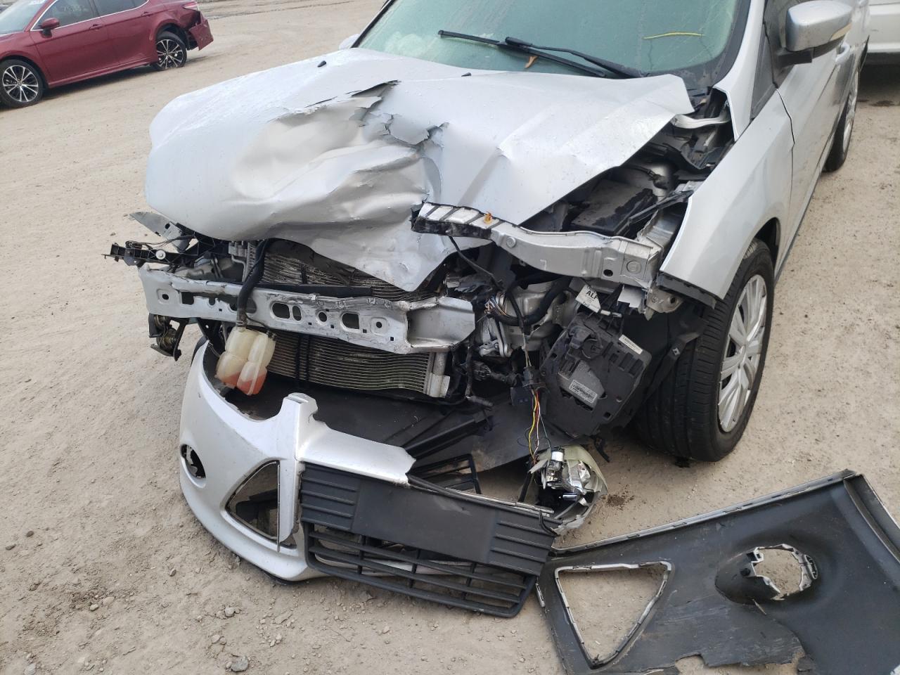 Photo 9 from auction – 2013 FORD FOCUS SE with VIN 1FADP3F26DL321462