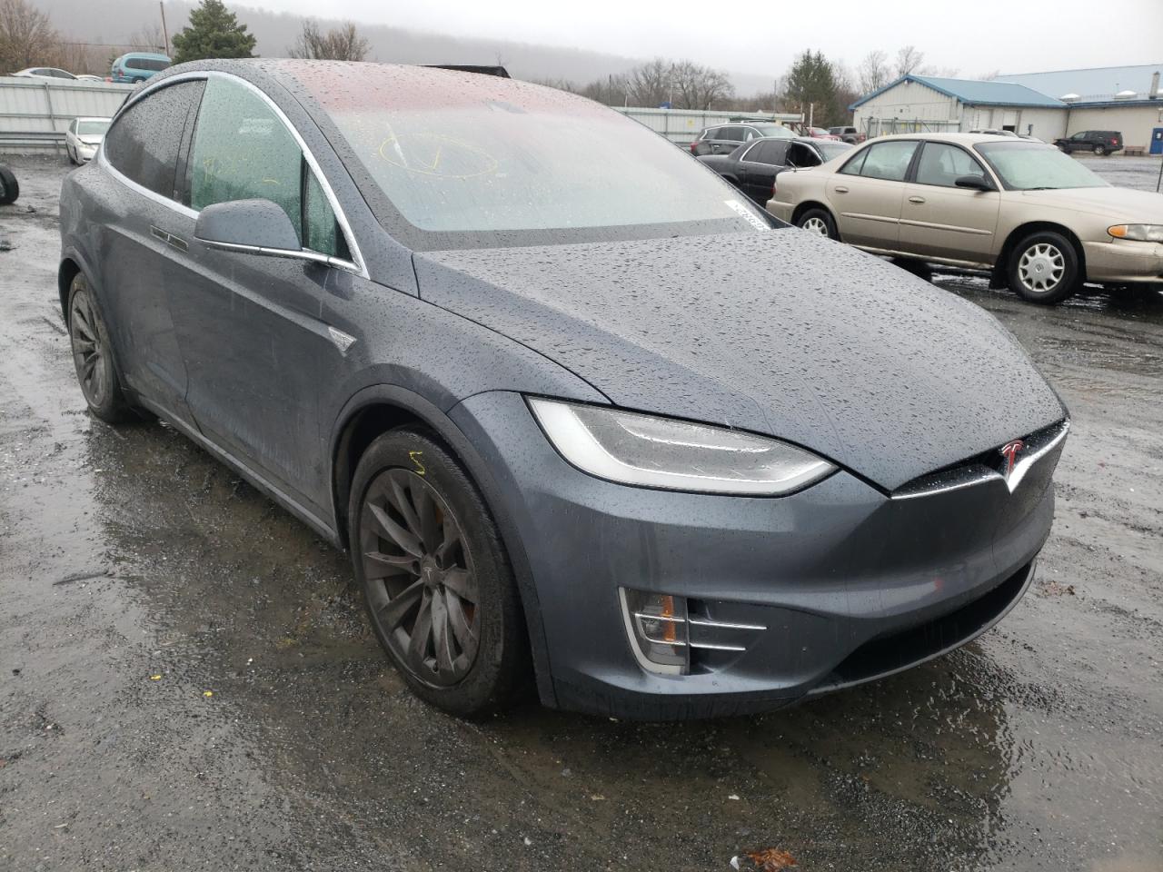 TESLA MODEL X 2016 with VIN 5YJXCBE29GF021324 - Photo from auction