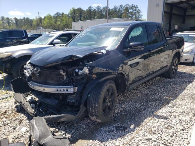 Photo 2 from auction – 2017 HONDA RIDGELINE with VIN 5FPYK3F89HB029447