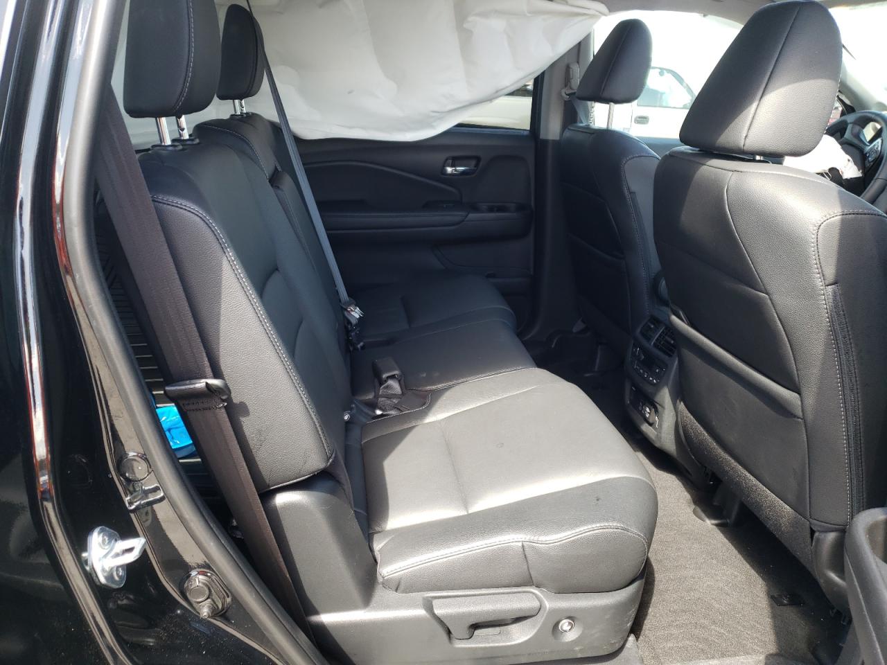 Photo 6 from auction – 2022 HONDA PILOT TOUR with VIN 5FNYF5H92NB013794