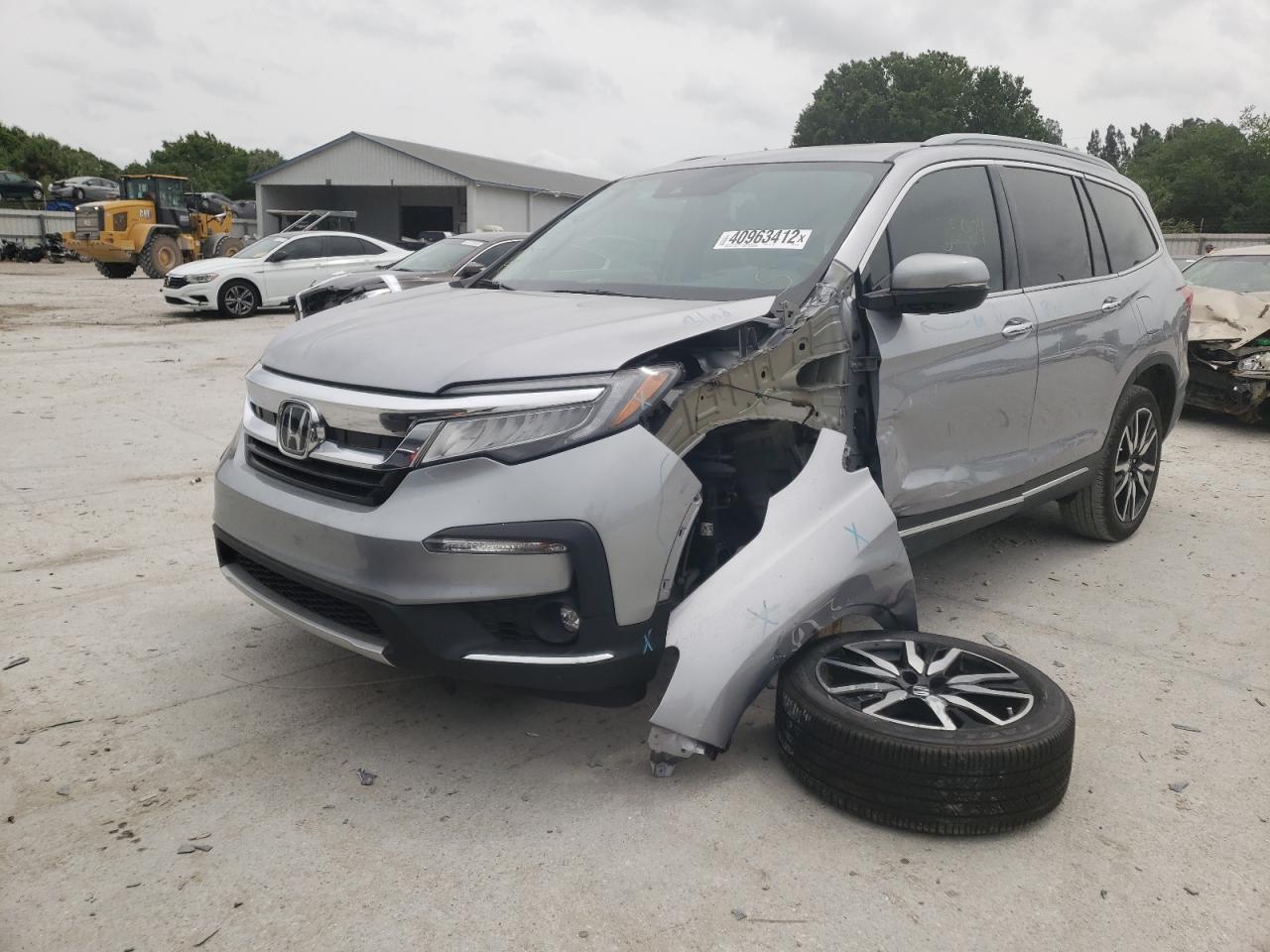 Photo 2 from auction – 2020 HONDA PILOT TOUR with VIN 5FNYF5H91LB025528