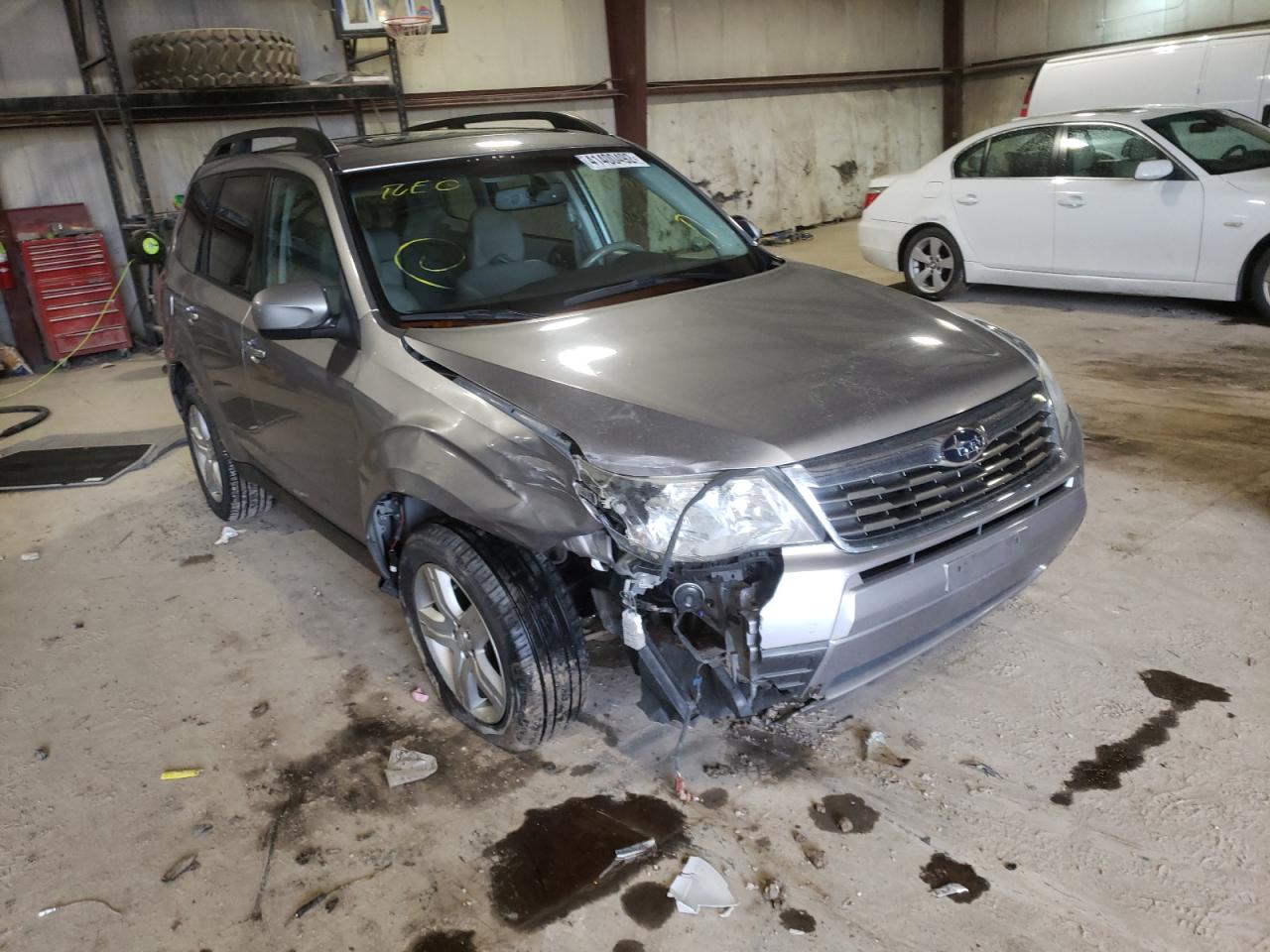 SUBARU FORESTER 2010 with VIN JF2SH6DC9AH906418 - Photo from auction