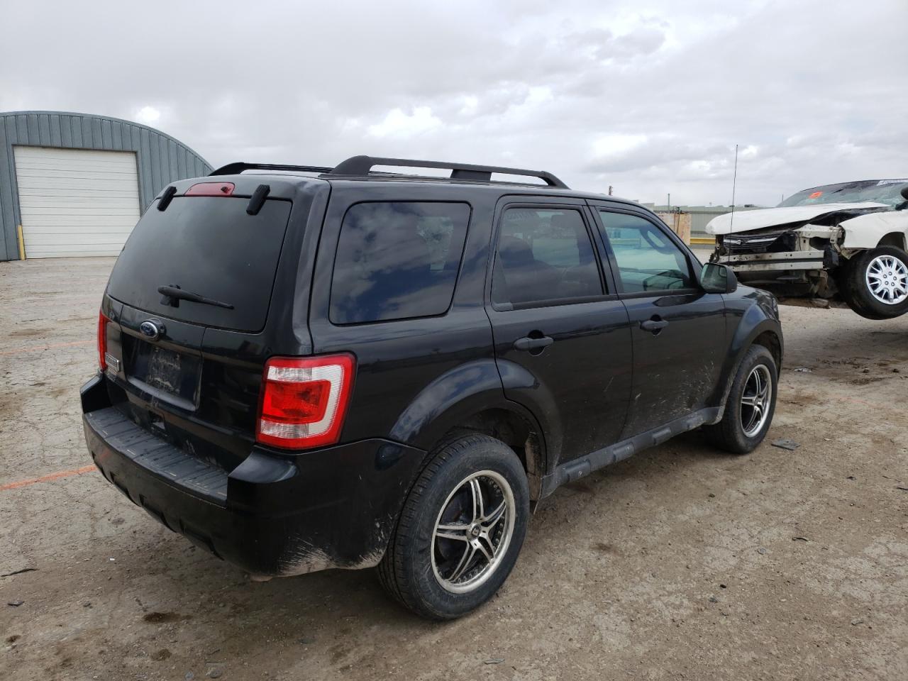 Photo 4 from auction – 2011 FORD ESCAPE XLT with VIN 1FMCU9D70BKA25559