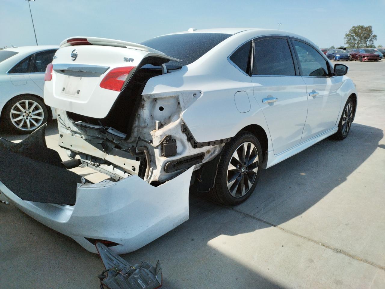 Photo 4 from auction – 2016 NISSAN SENTRA S with VIN 3N1AB7AP1GY286754
