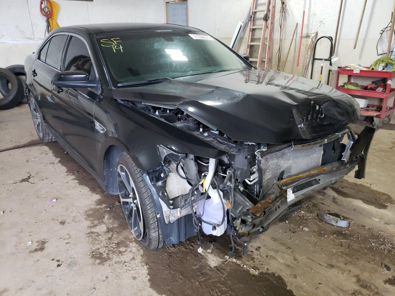 FORD TAURUS SEL 2014 with VIN 1FAHP2H83EG130041 - Photo from auction