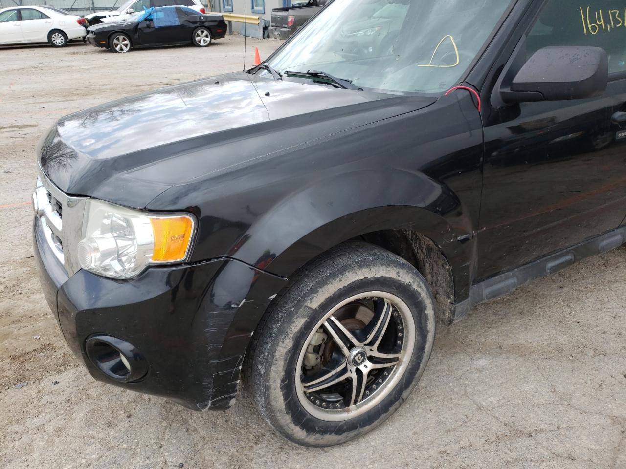 Photo 9 from auction – 2011 FORD ESCAPE XLT with VIN 1FMCU9D70BKA25559