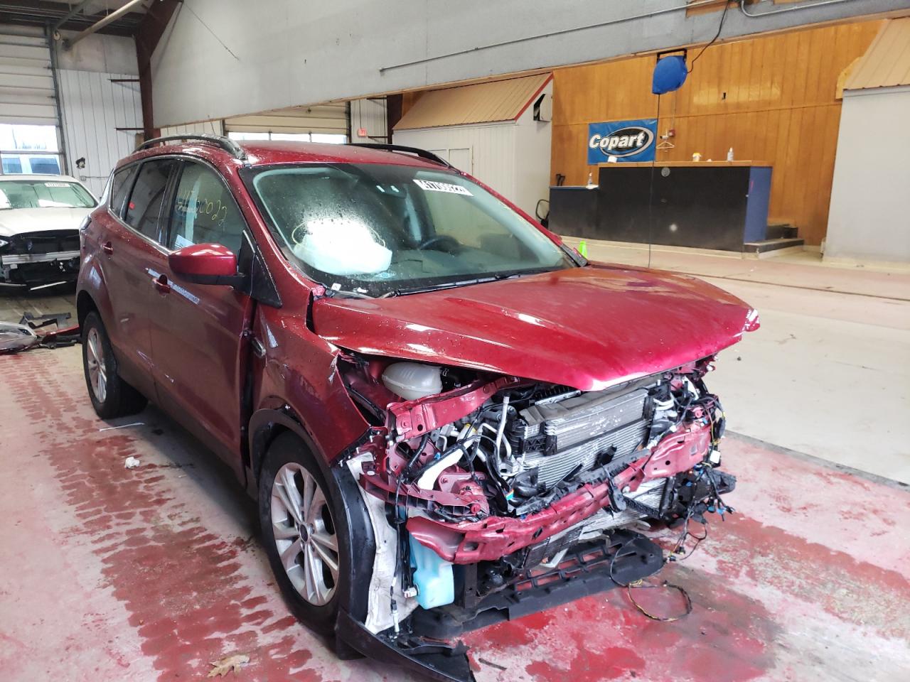 FORD ESCAPE SEL 2018 with VIN 1FMCU0HD6JUC57677 - Photo from auction