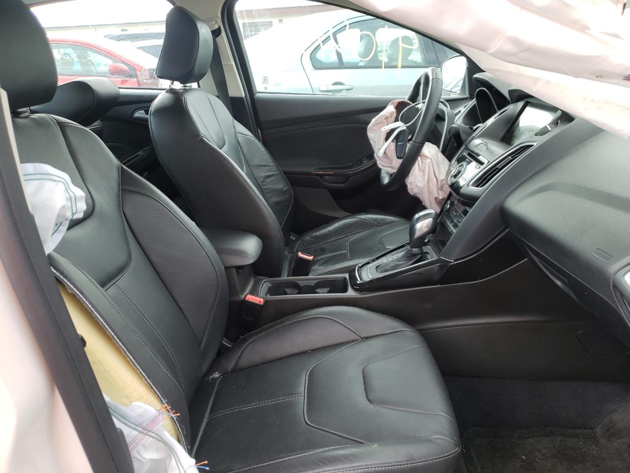 Photo 5 from auction – 2016 FORD FOCUS TITA with VIN 1FADP3J23GL358917