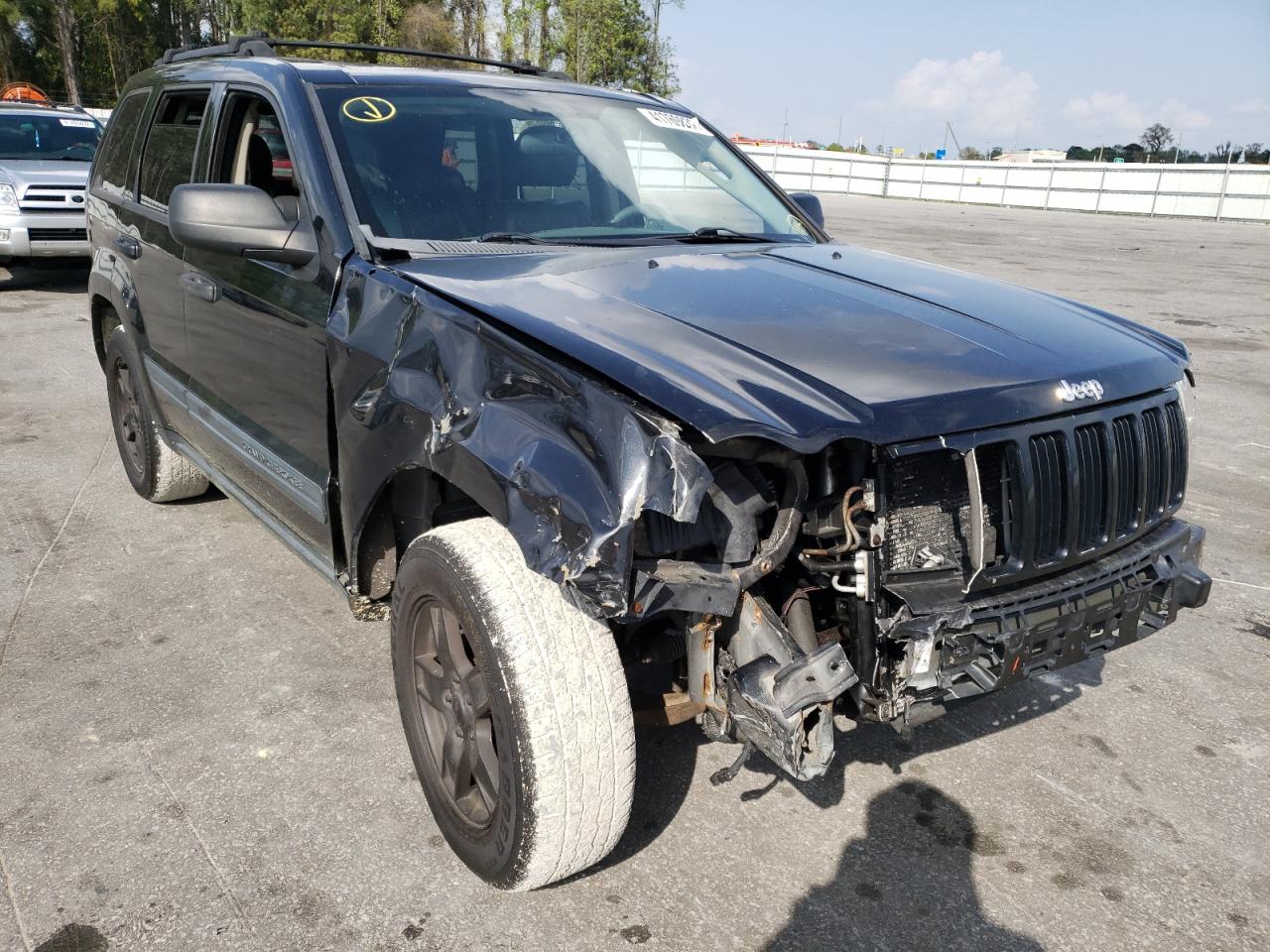 JEEP GRAND CHER 2005 with VIN 1J4GR48K95C577319 - Photo from auction