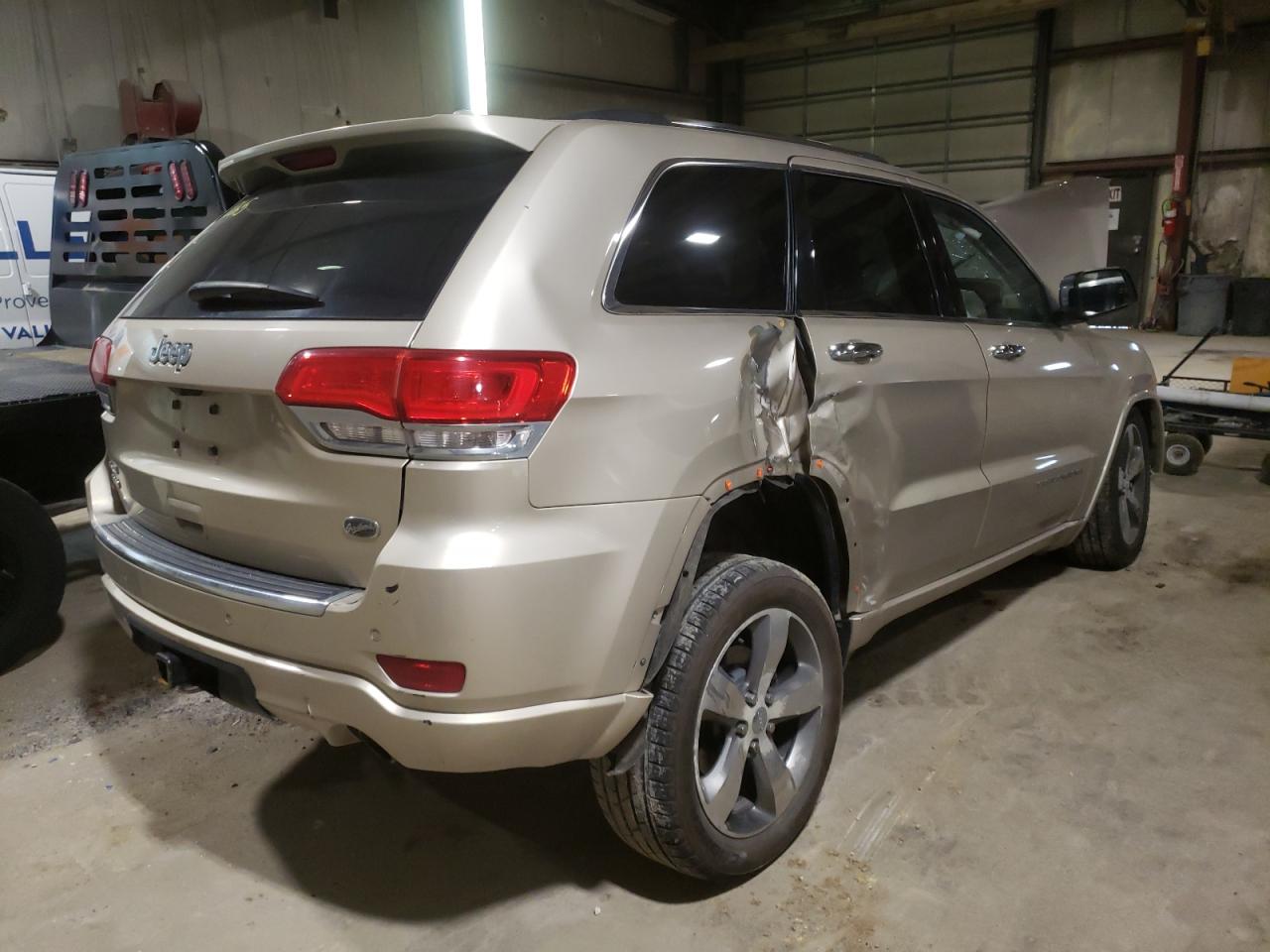 Photo 4 from auction – 2014 JEEP GRAND CHER with VIN 1C4RJFCGXEC190265