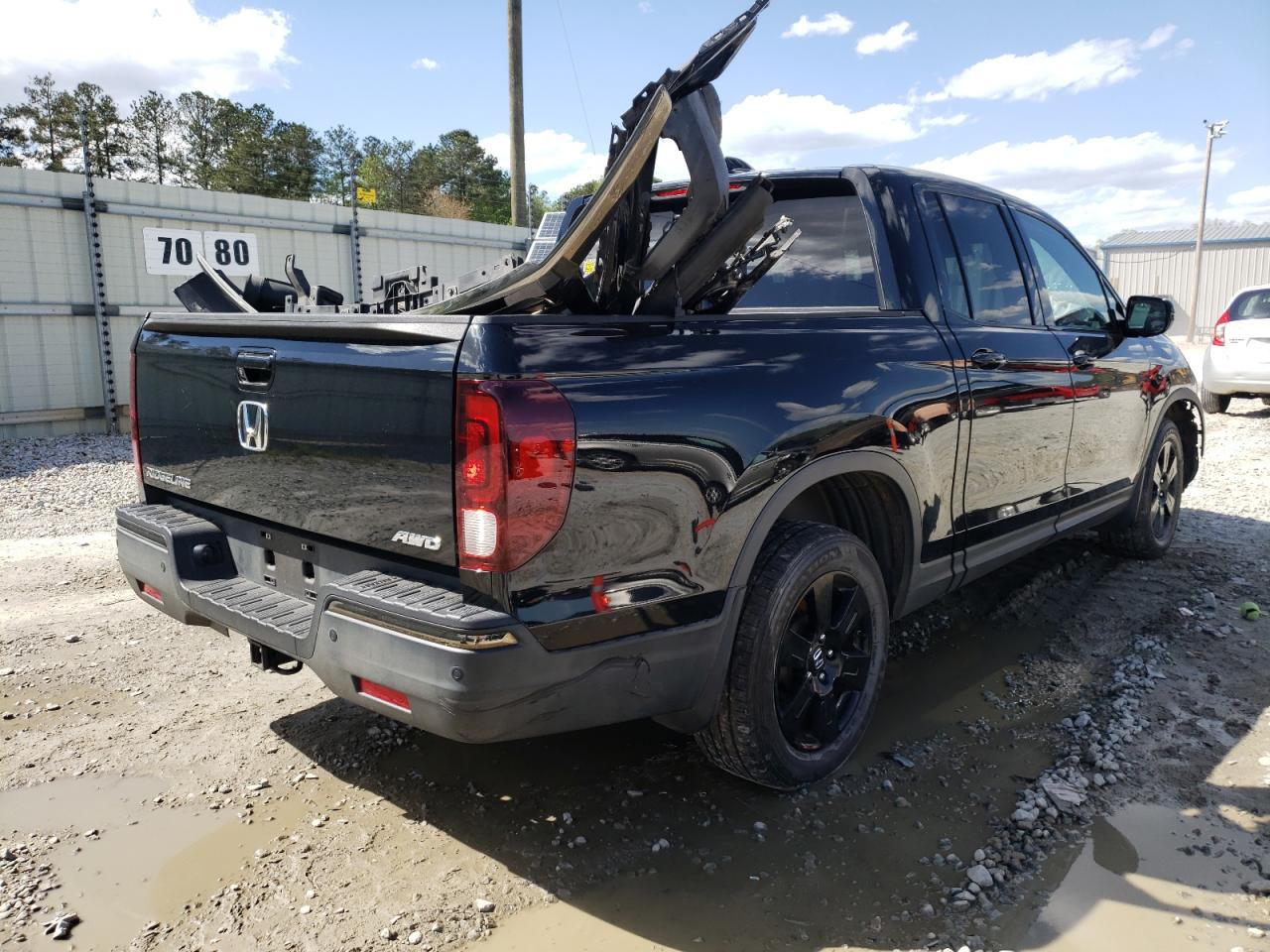 Photo 4 from auction – 2017 HONDA RIDGELINE with VIN 5FPYK3F88HB039421